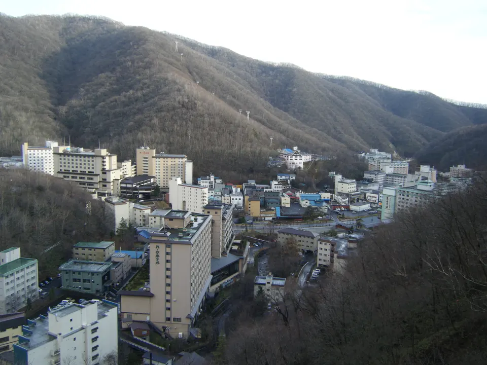 Buildings and mountain scenery in Noboribetsu, Hokkaido.