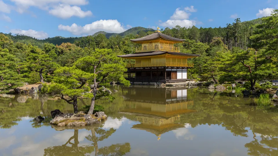 Kyoto’s Golden Pavilion reflected in a pond.